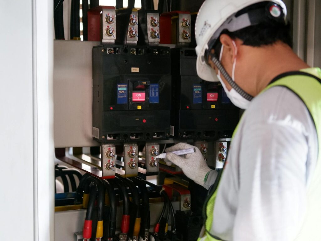 industrial-control-panel Engineer working on industrial control panel